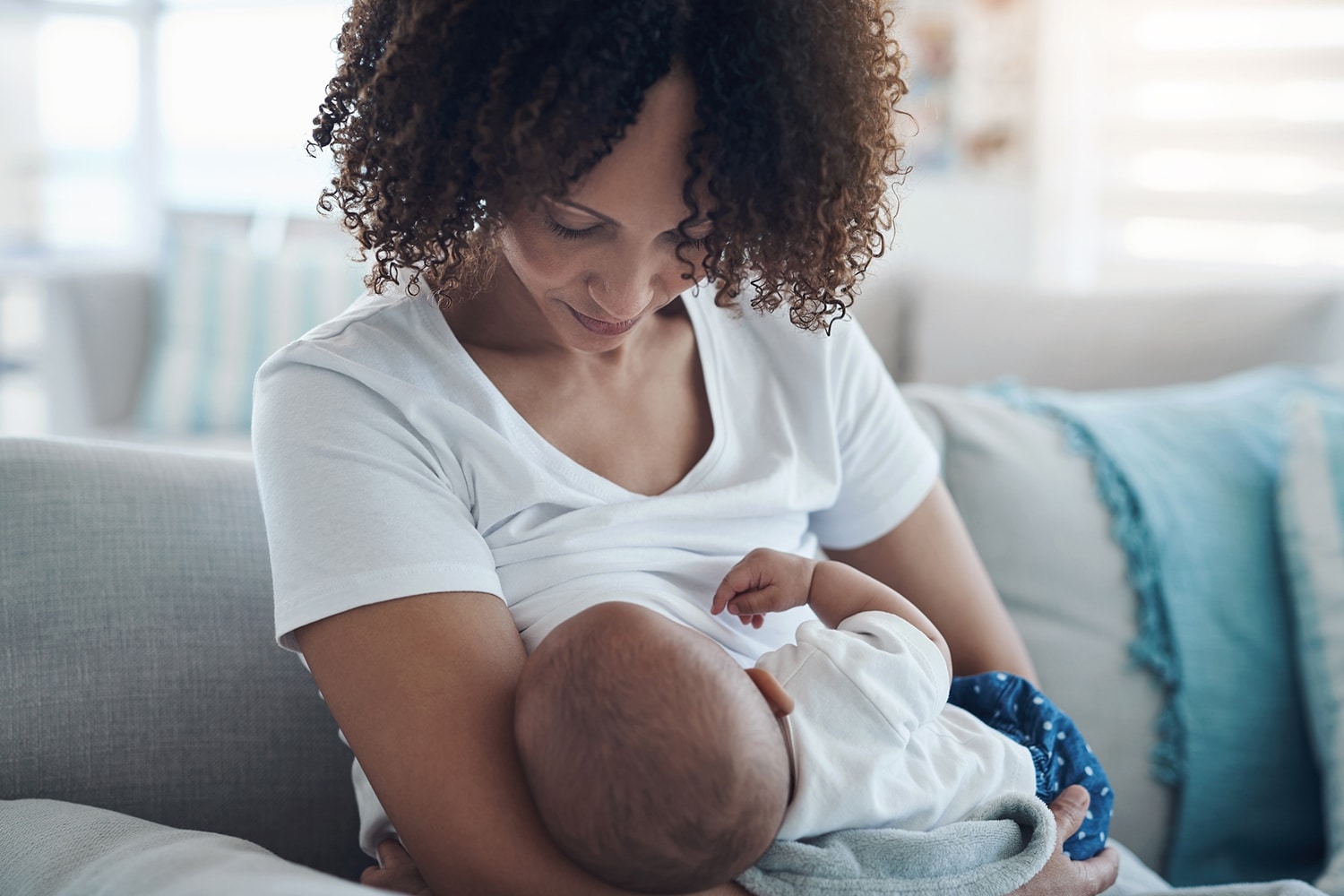 A new mother breastfeeding her baby.